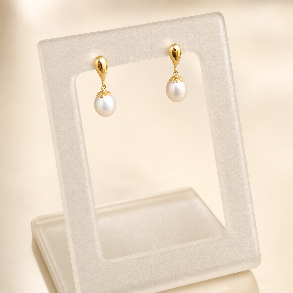 Brincos pêndulo com pérola — ouro 18k