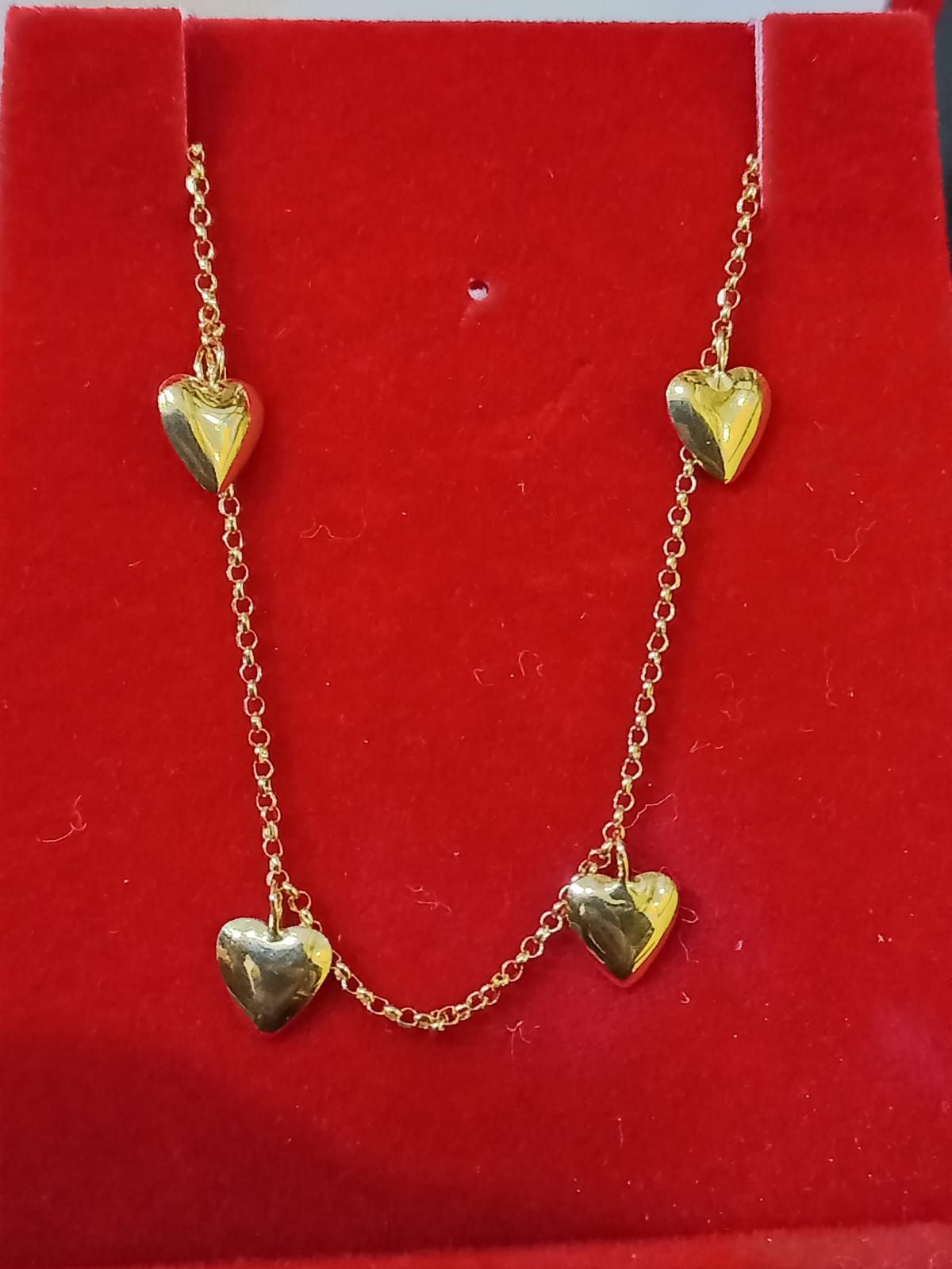 Gargantilha 7 corações — ouro 18k